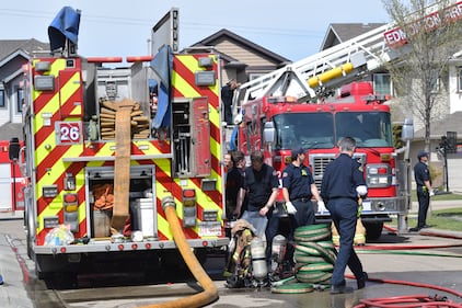 A duplex at 29 Avenue and 15 Street was damaged by fire on May 12, 2026. (Dave Mitchell/CTV News Edmonton)