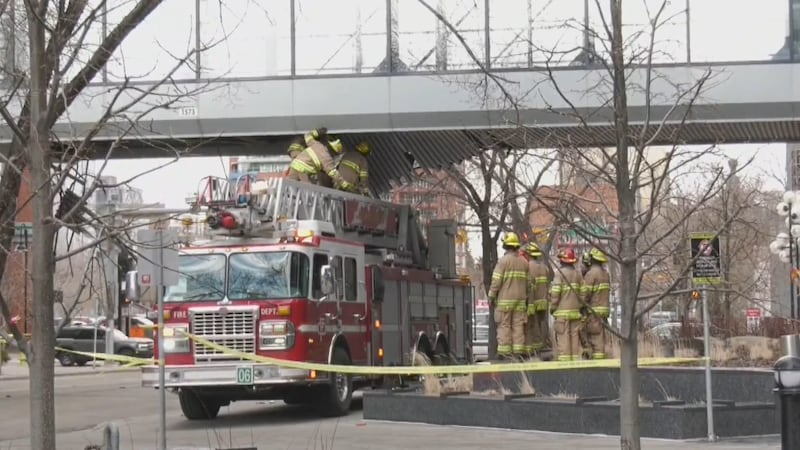 Roads closed downtown as metal falls from Plus 15 walkway