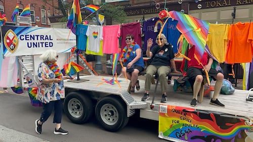 Hundreds of people lines Main Street in Moncton on Saturday for the annual Pride parade. (CTV/Derek Haggett)