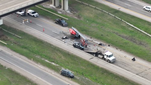 Crews work to clear debris at a crash scene in the westbound lanes of Highway 16 at Highway 60 the morning of May 28, 2026. (Sean McClune / CTV News Edmonton)