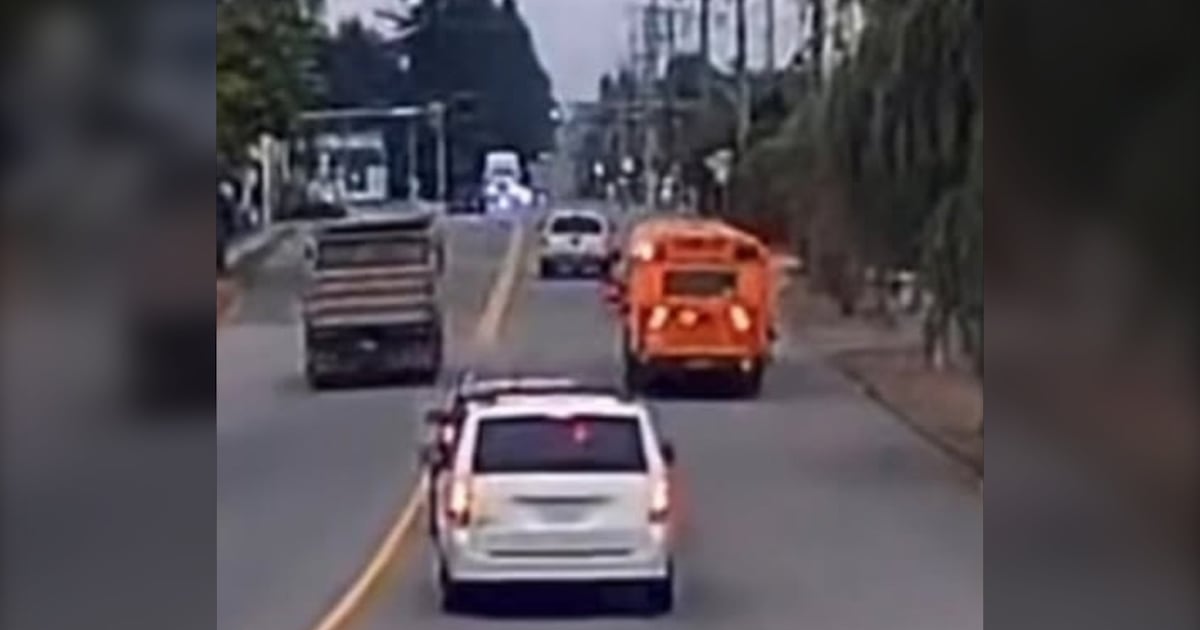 Abbotsford dump truck driver ticketed for passing school bus - CTV News