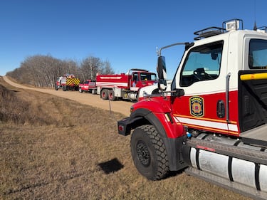 Firefighters from Wainwright and the military were on scene outside CFB Wainwright on Sunday, Oct. 18, 2026 after fire broke out at the base the previous afternoon. (Kent Morrison/CTV News Edmonton)