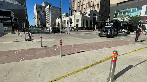 A driver was hospitalized after rolling their vehicle at 100 Street and 102 Avenue, disrupting LRT service for several hours, in Edmonton on June 24, 2026. (Evan Klippenstein / CTV News Edmonton)