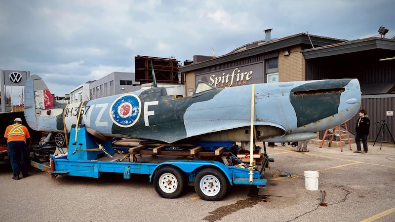 Spitfire replica removed from KW Surplus rooftop, donated to aviation association in Tillsonburg