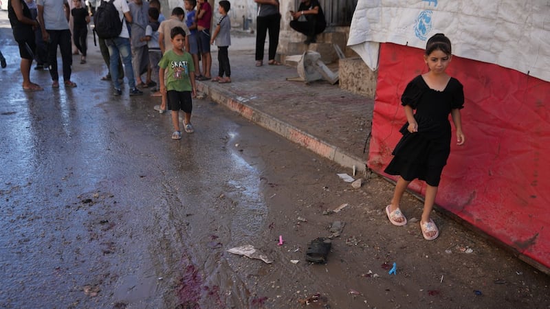 An Israeli strike on a funeral in Gaza kills 7 people and wounds 22, a local hospital says