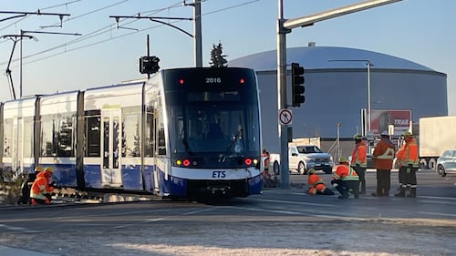 Crews and police respond to a morning crash between an LRT train and a semi-truck on Nov. 26, 2025. (Evan Klippenstein/CTV News Edmonton)