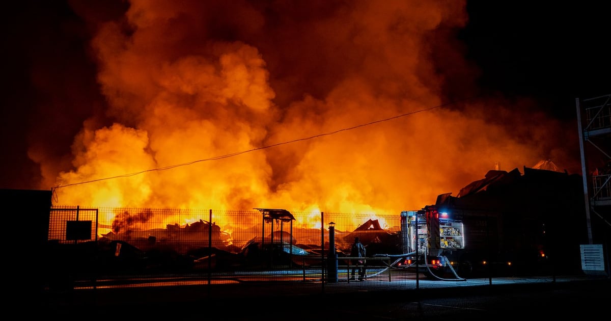 Firefighters put out a fire after Russian missiles hit a warehouse in Kyiv, Ukraine, Wednesday, Aug. 5, 2026. (AP Photo/Dan Bashakov)