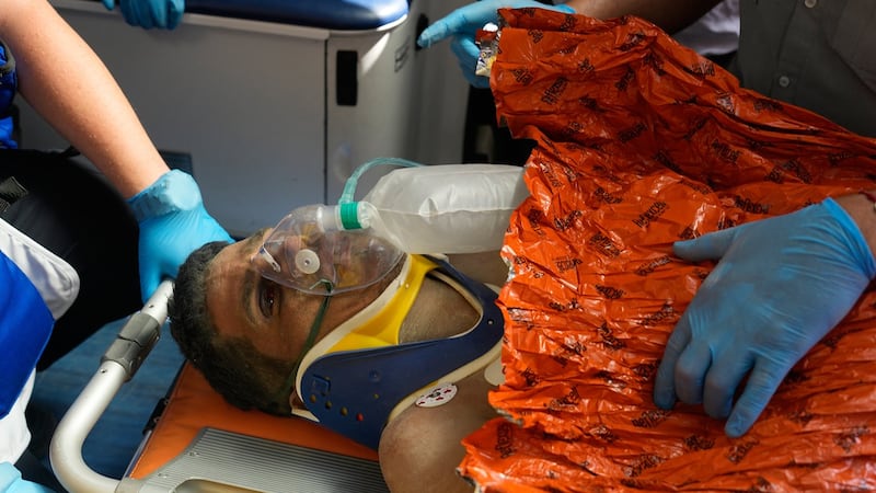 Venezuelan security guard pulled alive from building basement 8 days after twin quakes