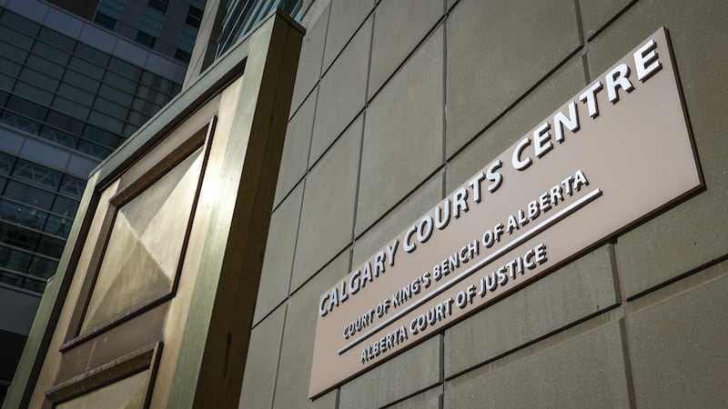 Calgary man accused of killing his children retains lawyer, remains in custody