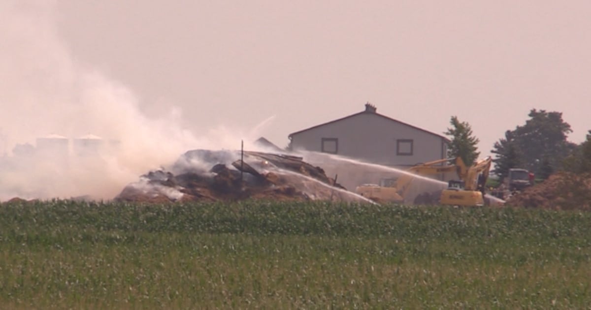 Shed fire smouldering for nearly 20 hours near Palmerston