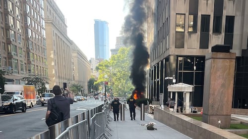 Person in custody after smoke and flames erupt outside New York federal building, FBI says