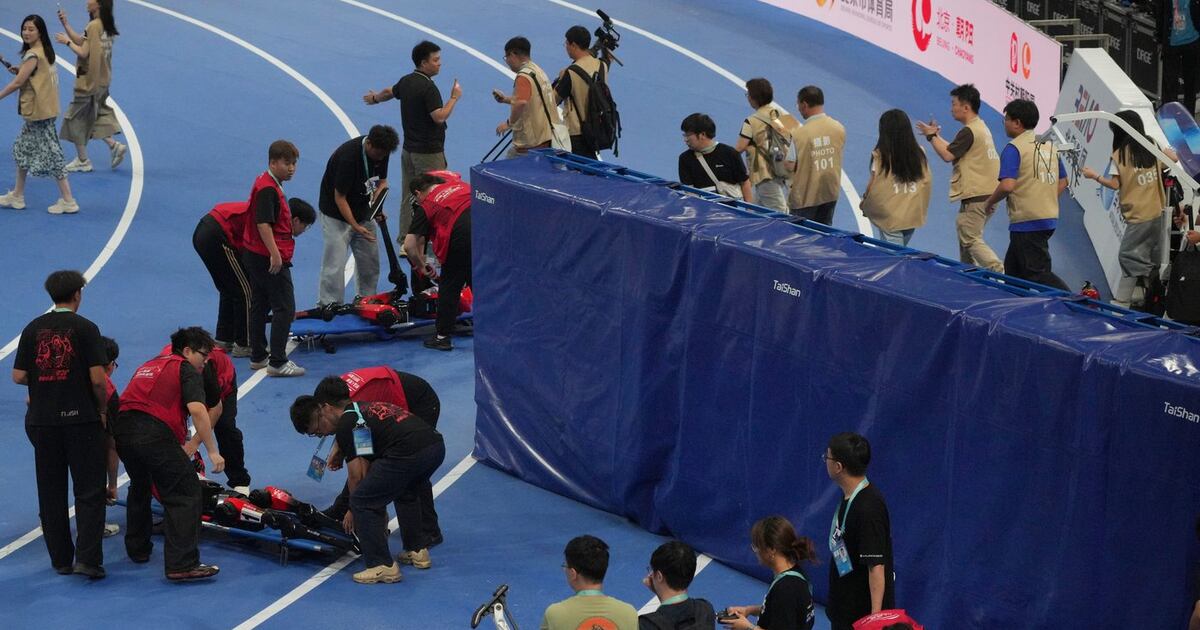 A Chinese humanoid robot sets a new 100-metre sprint record at Beijing ...