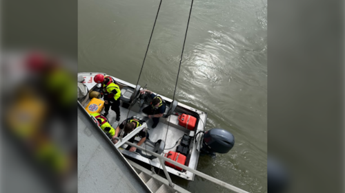 Passengers on the Edmonton Riverboat are helped to shore by Edmonton Fire Rescue Services during a Mother's Day cruise on May 10, 2026. (Source: Christa Jones)