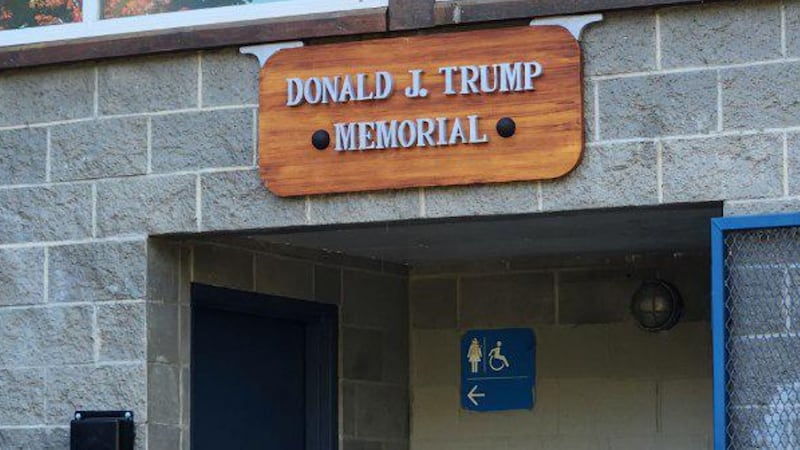 ‘Donald J. Trump Memorial’: Rogue sign put up outside B.C. bathroom