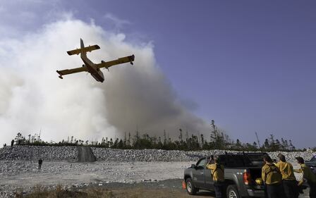 A water bomber make a pass over the Susies Lake wildfire in Halifax Regional Municipality. (Source: Province of Nova Scotia)
