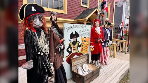 Pirate scarecrows are pictured.