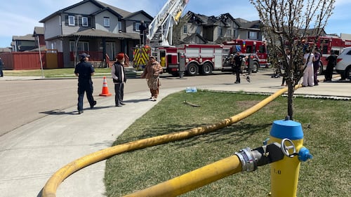 A duplex at 29 Avenue and 15 Street was damaged by fire on May 12, 2026. (Dave Mitchell/CTV News Edmonton)