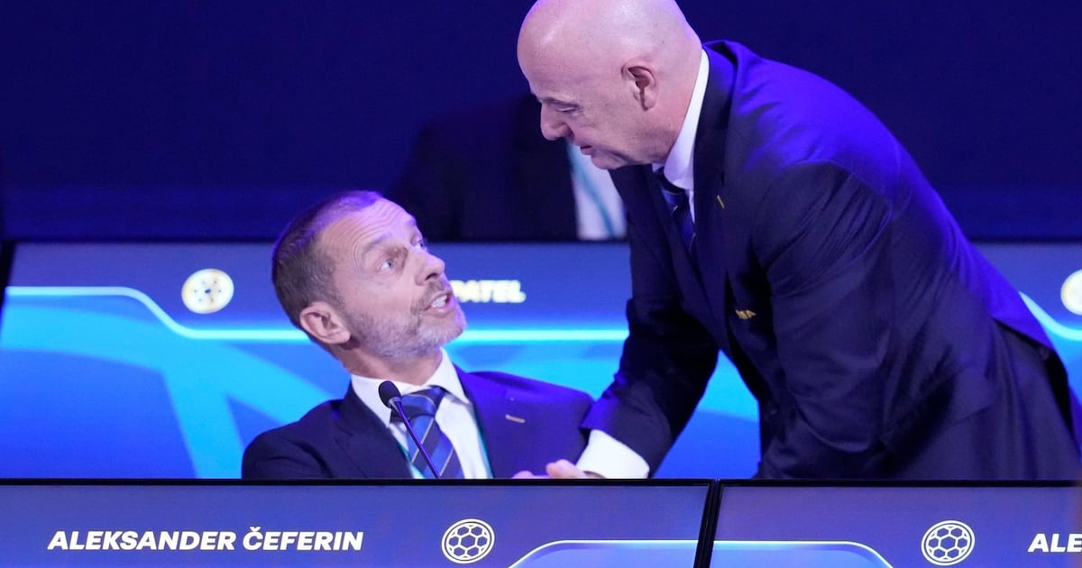 FIFA President Gianni Infantino, right, talks to UEFA President Aleksander Ceferin during the FIFA 75th Congress at the Conmebol Convention Center in Luque, Paraguay, Thursday, May 15, 2025. (AP Photo/Fernando Calistro, File)