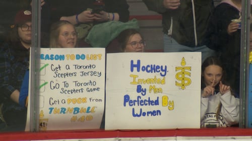 Fans hold up signs at a PWHL Takeover Tour game in Halifax between Montreal Victory and the Toronto Sceptres on Dec. 17, 2025. (CTV Atlantic / Jim Kvammen)