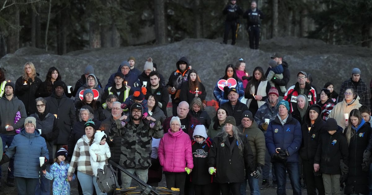 Photo: ctvnews.ca People attend a vigil for the victims of a mass shooting, in Tumbler Ridge, B.C., Friday, Feb. 13, 2026. THE CANADIAN
