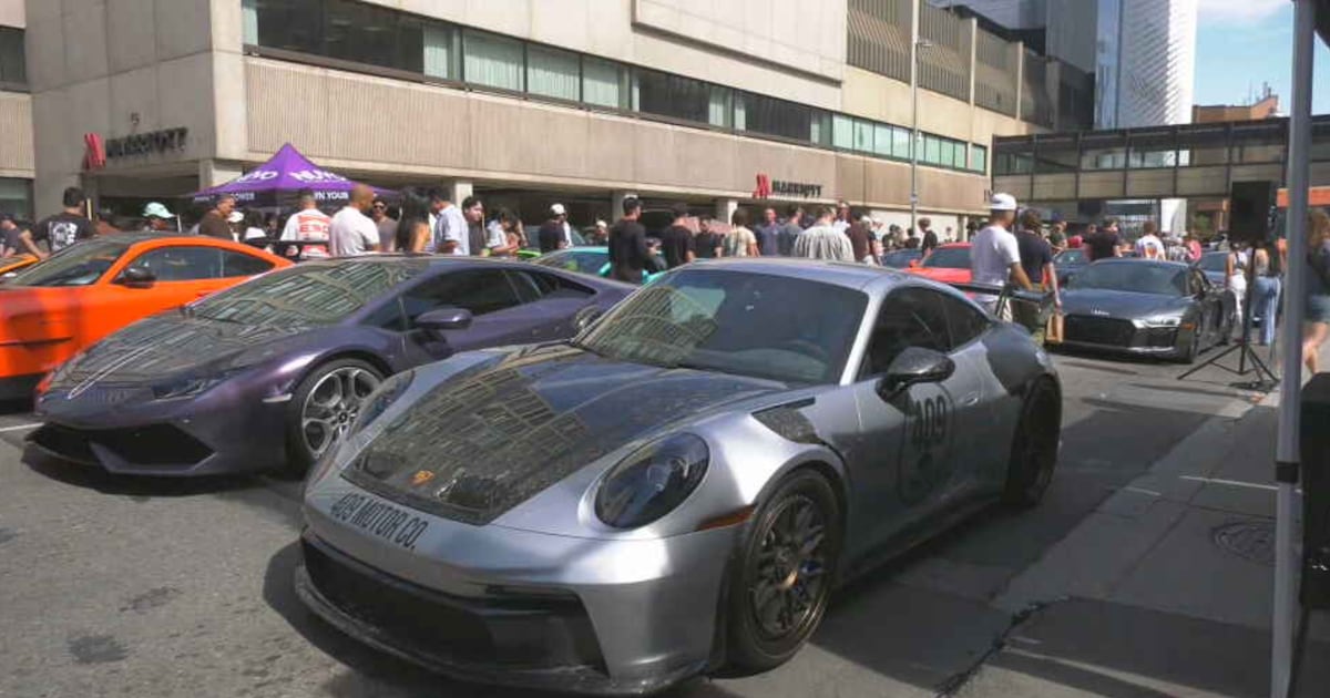 Supercars take over street below Calgary Tower
