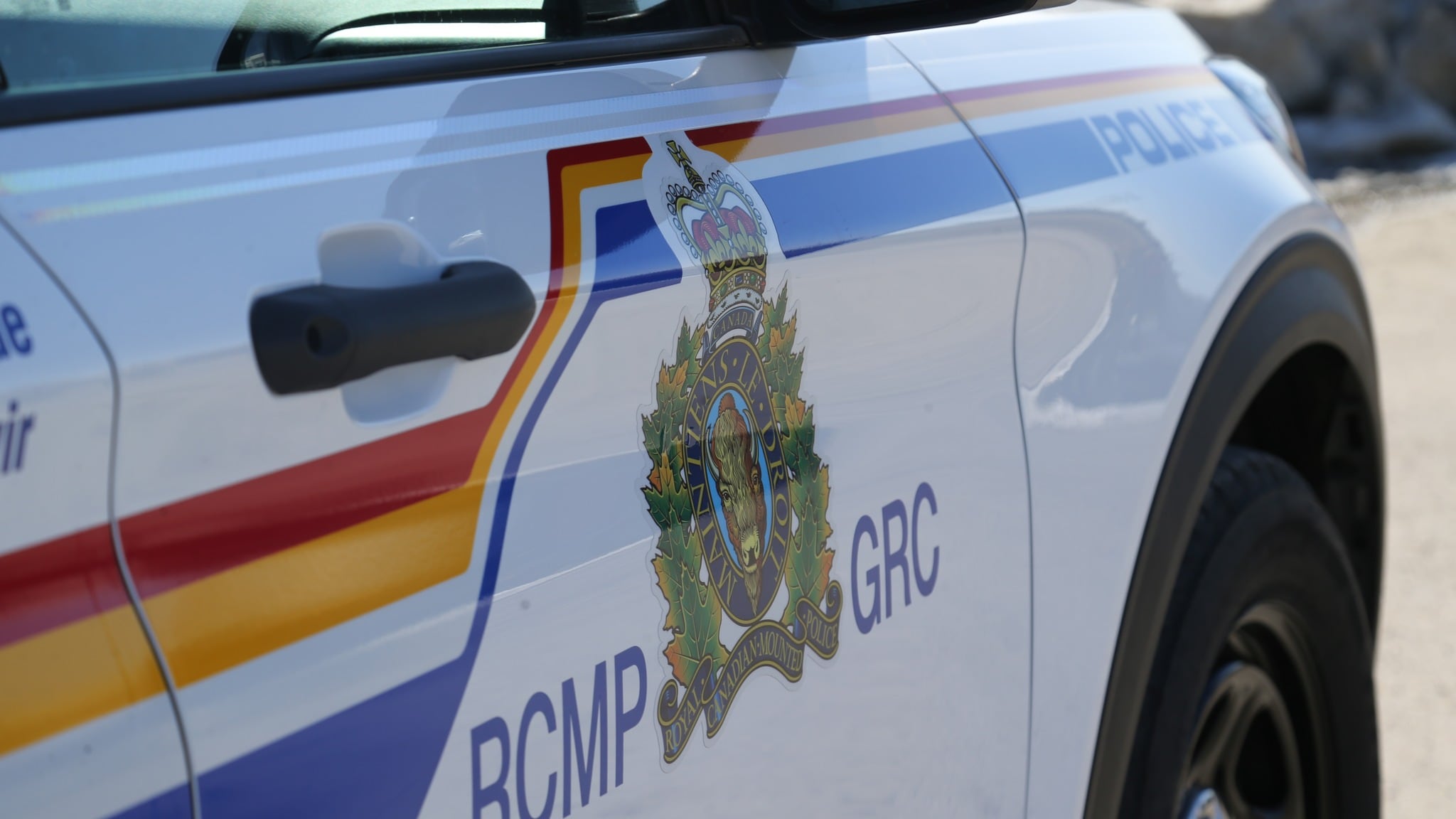 An RCMP cruiser is pictured with the logo painted on the side. (Source: Facebook)