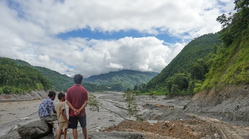 Mass burials in Nepal as death toll from flash floods exceeds 1,000