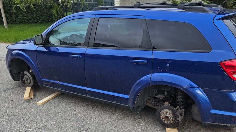 Vehicle stripped of all four tires in the night in front of Cochrane home