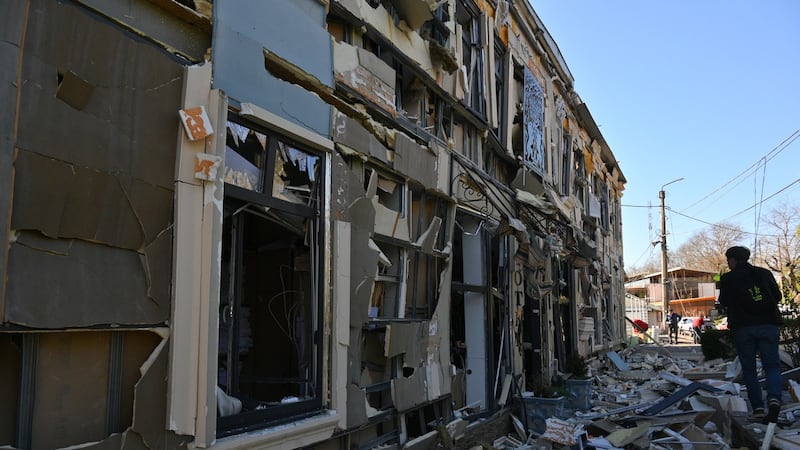 A predawn Russian drone strike hits Ukraine's Odesa, wounding 14; 2 killed in Russian-held Kherson