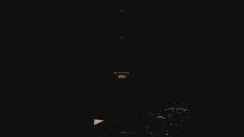 CN Tower dims lights in tribute after deadly shooting at Toronto street festival
