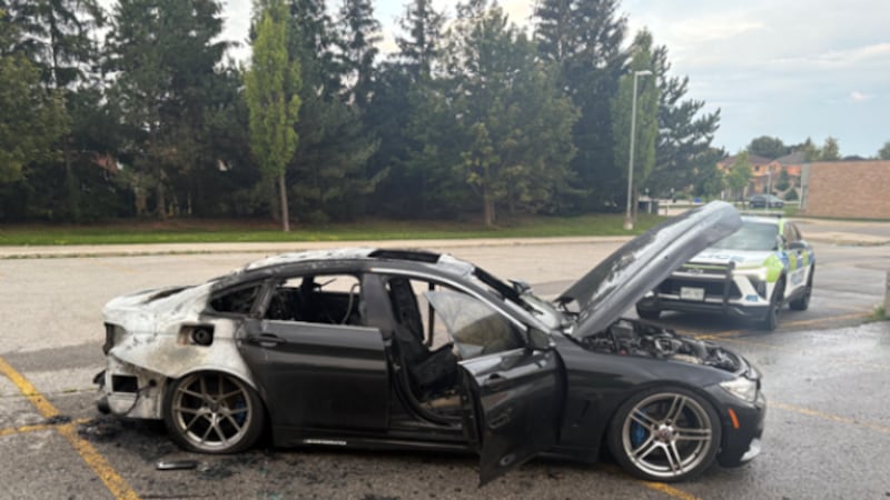Suspicious details emerge as police investigate car fire in school parking lot