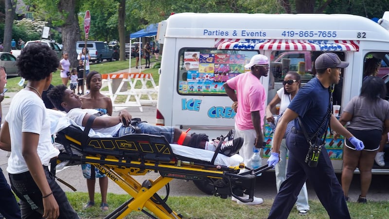 Police arrest a suspect in a shooting at an Ohio festival that wounded 12
