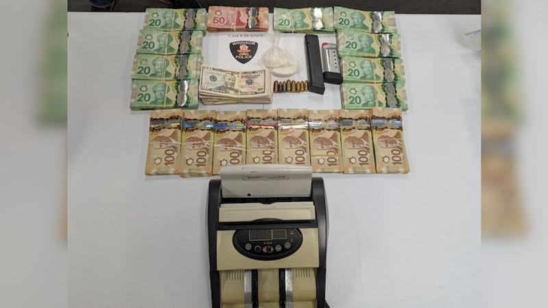 Two suspects arrested as police seize $121,000 in cash and drugs