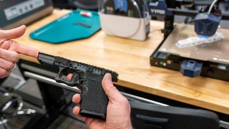 Some people are making guns with 3D printers. A new U.S. law seeks to cancel their print jobs