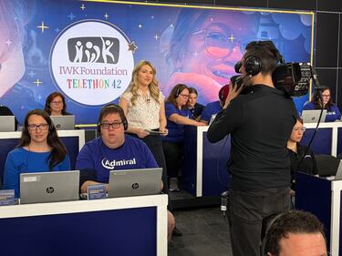 CTV's Emma Convey is pictured with cameraman Alec Cook at the 42 annual IWK Telethon. (CTV Atlantic / Mike Lamb)
