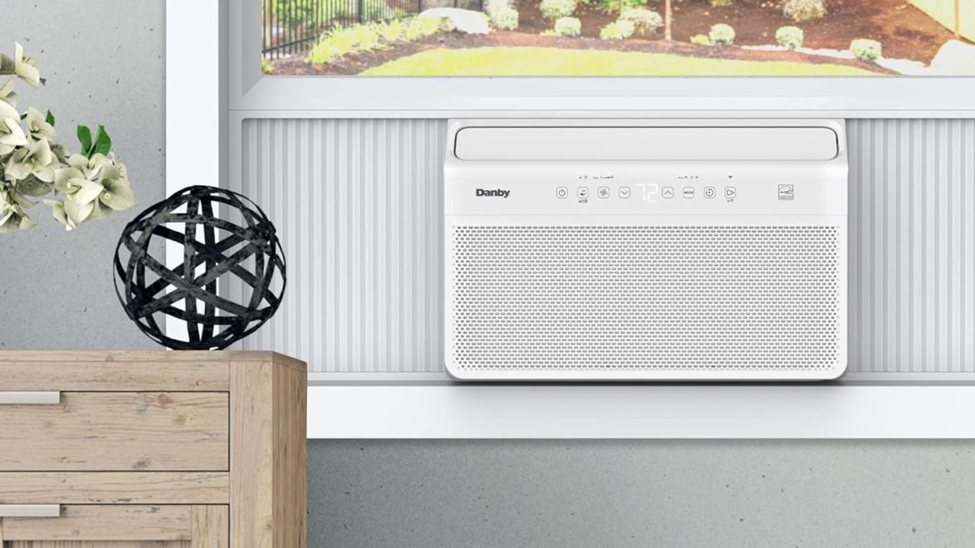 A Danby air conditioner in a window.