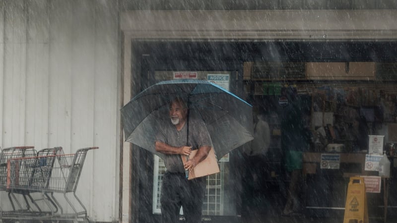 Lala is again a tropical storm, sending drenching rain and winds across the Hawaiian islands