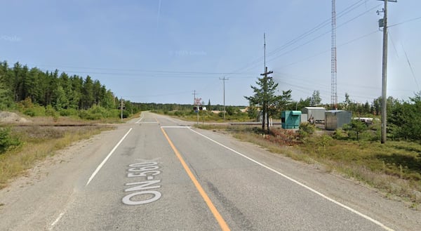 Logs from overturned truck collide with train in northern Ontario