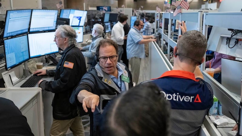 Wall Street muscles higher despite more swings for AI stocks