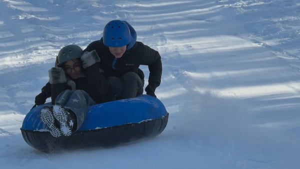 The day after: Snowstorm sends students tobogganing, drivers to tire shops