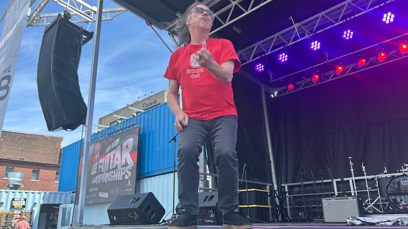 Air guitarist rock Area 506 stage in Saint John