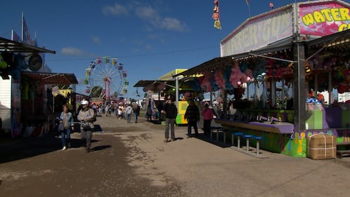Fairgrounds are pictured on a sunny day.