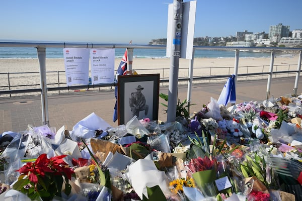 Man charged with stealing from Bondi shooting victim