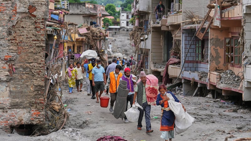 Nepal-China flood survivors reach safe areas as families await news of nearly 3,000 missing