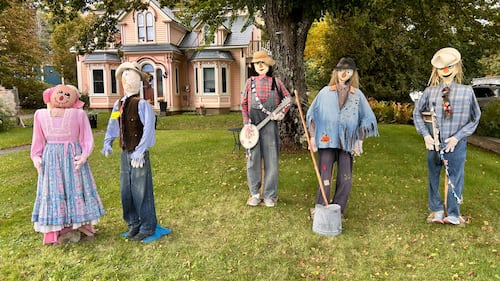 Scarecrows are pictured.