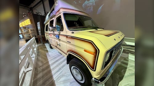 The exterior of a 1980s van is pictured.