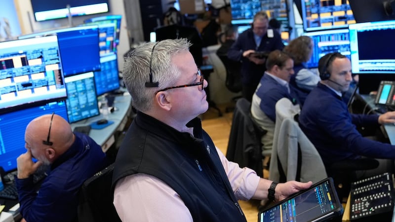 Wall Street remains near its record even after oil prices rise on worries about the Iran war