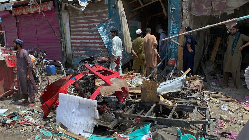Bomb rigged to rickshaw explodes in Pakistan bazaar, killing 9 and wounding more than 2 dozen others