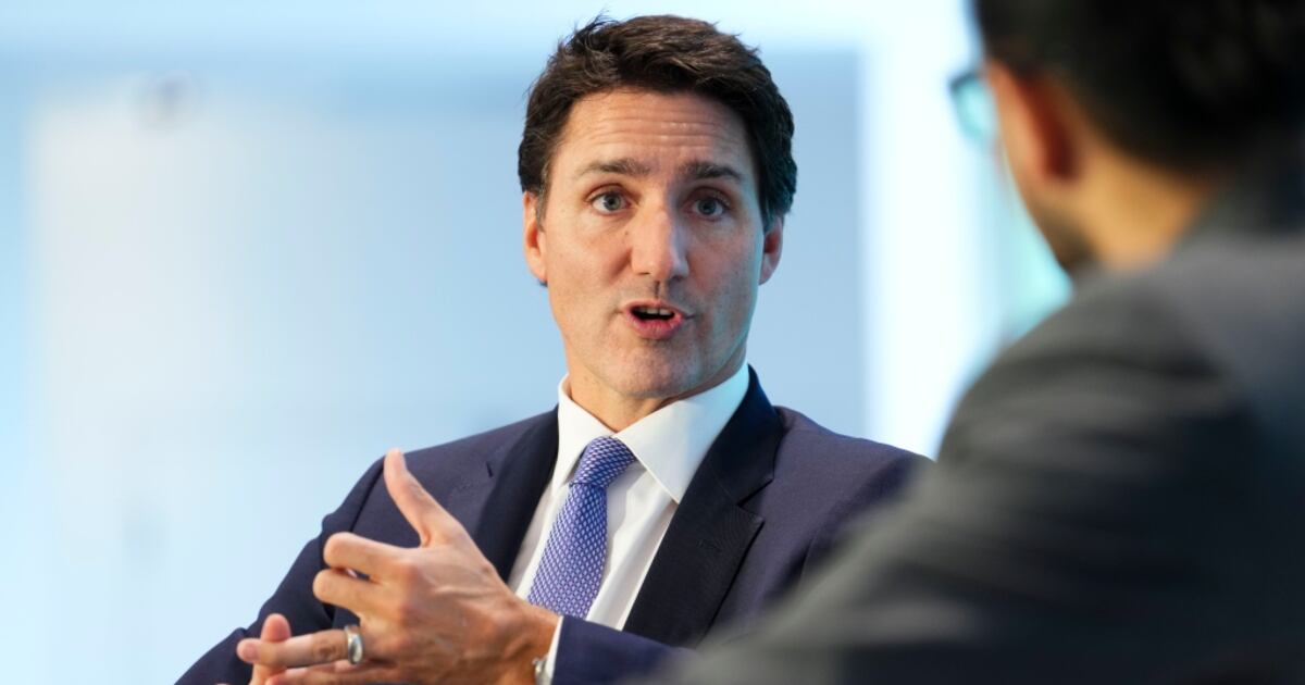 Sign Target Forhead Trudeau Trudeau guarantees this time Canada will meet its emissions target