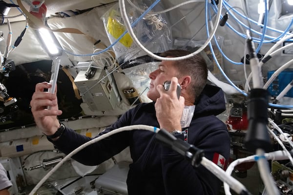 Canadian astronaut Jeremy Hansen sends well wishes to family back home from the edge of space